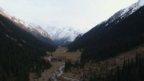 4K aerial drone footage of the Karakol valley in Terskey Ala-Too mountain range in Kyrgyzstan. 