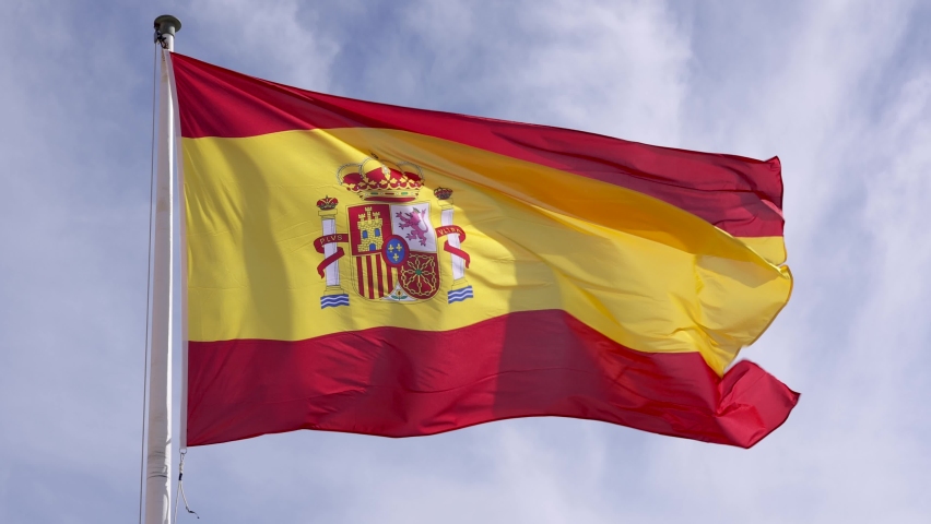 Closeup of flag of Spain waving in the wind in slow motion