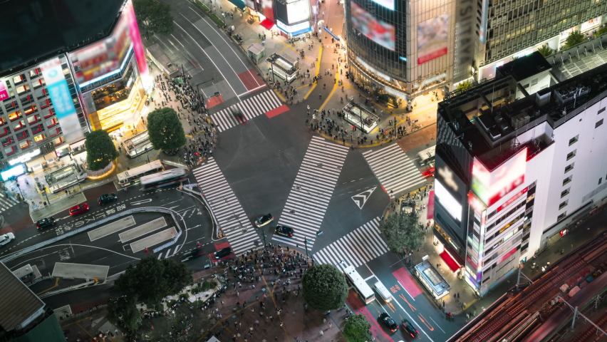 Time lapse overview of Shibuya Scramble Crossing at twilight in Tokyo, Japan Royalty-Free Stock Footage #1096268131