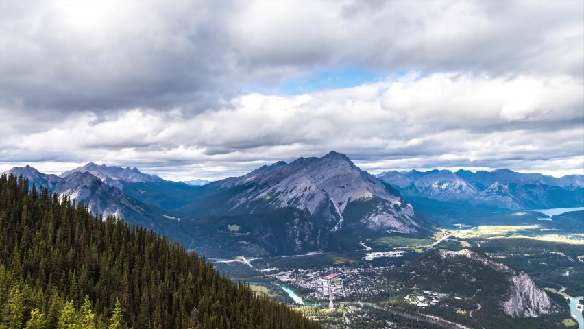 Uhd 4k Timelapse of Panoramic aerial view of Banff city in Bow Valley in Banff national park, Canadian Rockies Royalty-Free Stock Footage #1096268613