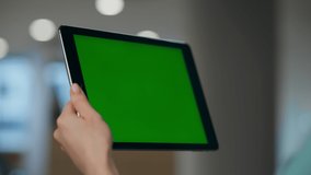 Unknown employee having mockup device conversation in office closeup. Anonymous woman manager making chromakey online video call job interview. Unrecognizable boss waving hand to green screen computer - Powered by Shutterstock - Get 15% off with code: PIKWIZARD15