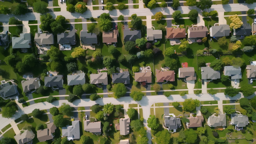 Aerial Drone above shot of american new suburb at summertime. Establishing shot of neighborhood. wide aerial footage Royalty-Free Stock Footage #1096278785