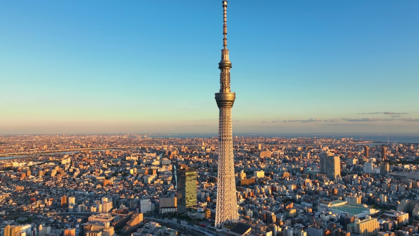 Tokyo Skytree at sunset, aerial view of Tokyo skyline with Tokyo Skytree, Japan. Famous tourist landmark in Tokyo. High quality 4k footage Royalty-Free Stock Footage #1096289083