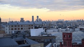 Moscow cityscape at sunset. Panoramic view of rooftops in downtown district with Moscow Kremlin and Saint Basil's Cathedral. Real time video. Selective focus.Travel in Russia theme.