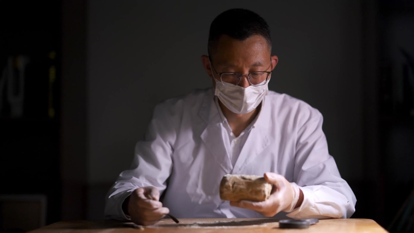 archaeology of bone with ancienct inscription