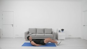 athlete do abs crunch. sport concept. sport athlete do abs crunch at home. athlete man - Powered by Shutterstock - Get 15% off with code: PIKWIZARD15