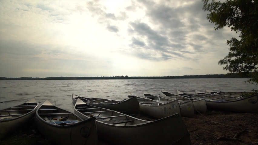 Canoes on a lake shore in Sweden, Timelapse 