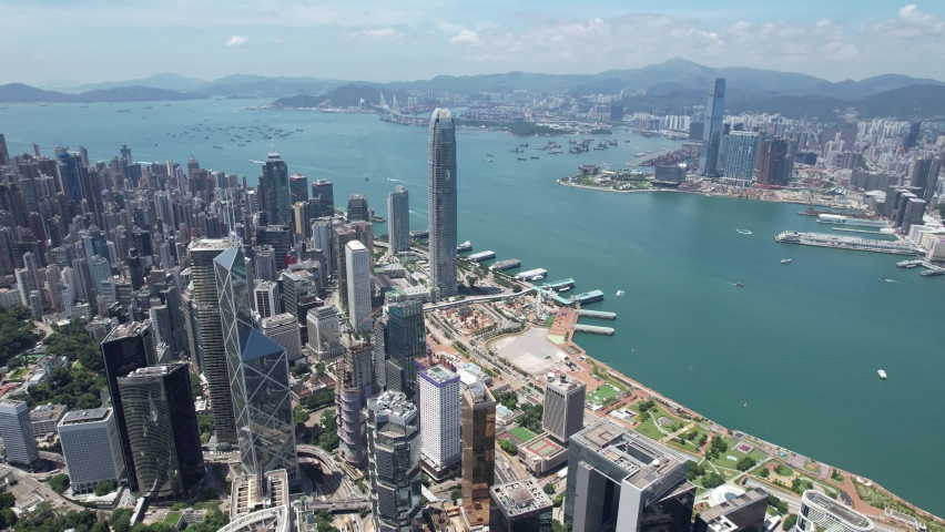 Drone aerial shot city Skyview in Wan Chai Central Admiralty Causeway Bay Hong Kong Island, a commercial hub with the financial business along the sides of the Victoria Harbour