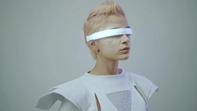 Representation of a bionic super human with advanced technology parts as vr visors and gadgets playing in a mixed reality training room. Futuristic cyberpunk evolution of human mankind and AI