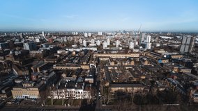 Establishing Aerial View Shot of London UK, United Kingdom, East London, Poplar, Stratford, East Ham, Hackney, Wanstead, Woodford, Forest Gate, Bromley, beautiful sunny day