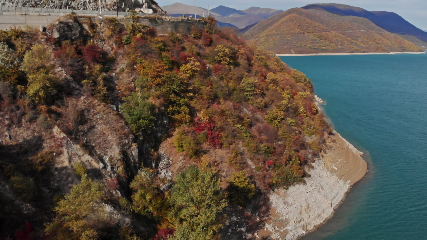 Tree covered mountains and Zhinvali Dam in distance, Caucasus, Georgia
