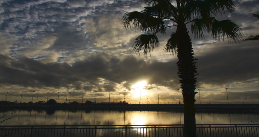 Timelapse Lockdown Of Passing Clouds And A Setting Sun Along Famous Beach - Daytona, Florida