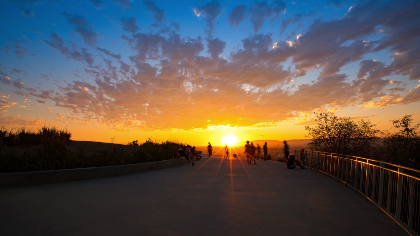 Time Lapse Lockdown Shot Of People Doing Exercise In Park On Mountain Under Cloudy Sky At Sunset - Rocky Mountain National Park, Colorado