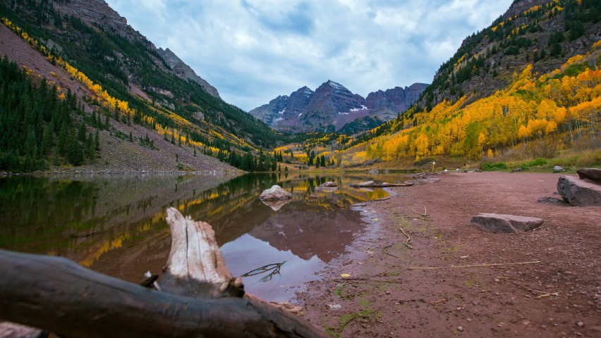 Time Lapse Beautiful View Of Maroon Bells Under Clouds While Tourists Exploring During Vacation - Elk Mountains, Colorado