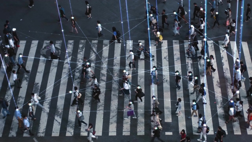 High Angle Shot of a Crowded Pedestrian Crossing in Big City. Augmented Reality Shows Visual Representation of Connected People with the Internet World, Technology Around Us and Wi-Fi Wave Network. Royalty-Free Stock Footage #1096401293
