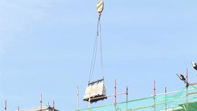 Animation of data processing over world map against construction site. Computer interface and architecture business technology concept - Powered by Shutterstock - Get 15% off with code: PIKWIZARD15