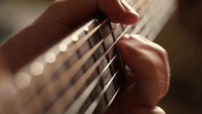 Acoustic guitar solo fingers on fretboard macro, guitar player playing music - Powered by Shutterstock - Get 15% off with code: PIKWIZARD15