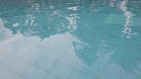 Water surface texture. clean swimming pool ripples and wave 4K video