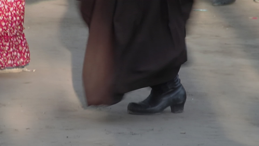 A Gaucho Dancing, "Zapateo" is a Traditional Argentine Folklore Dance originated in Santiago del Estero province, Argentina. Low Angle View.   Royalty-Free Stock Footage #1096419163