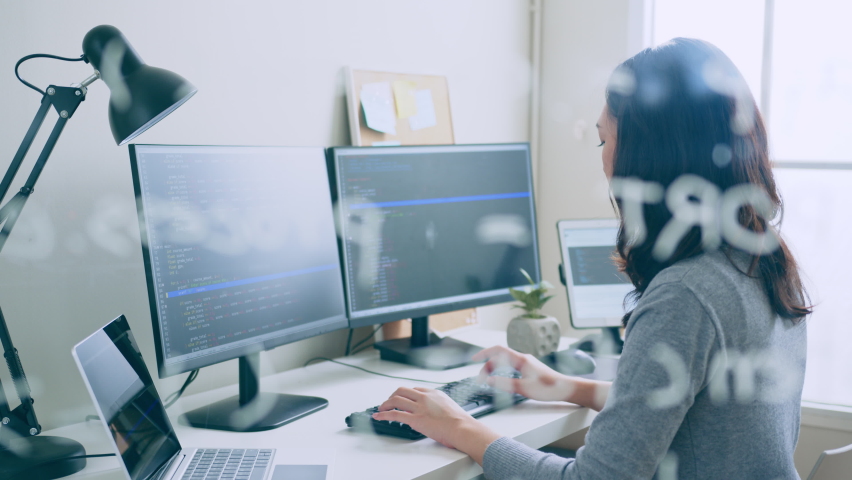 Young Asian woman, developer programmer, software engineer, IT support, working hard on computer to check coding in bugging system Royalty-Free Stock Footage #1096419617