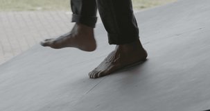 men's foot on a stage without shoes