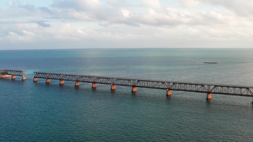 Aerial video of the Flagler Overseas Railway Bridge, A1A Highway, and Bahia Honda state park on Big Pine Key Florida