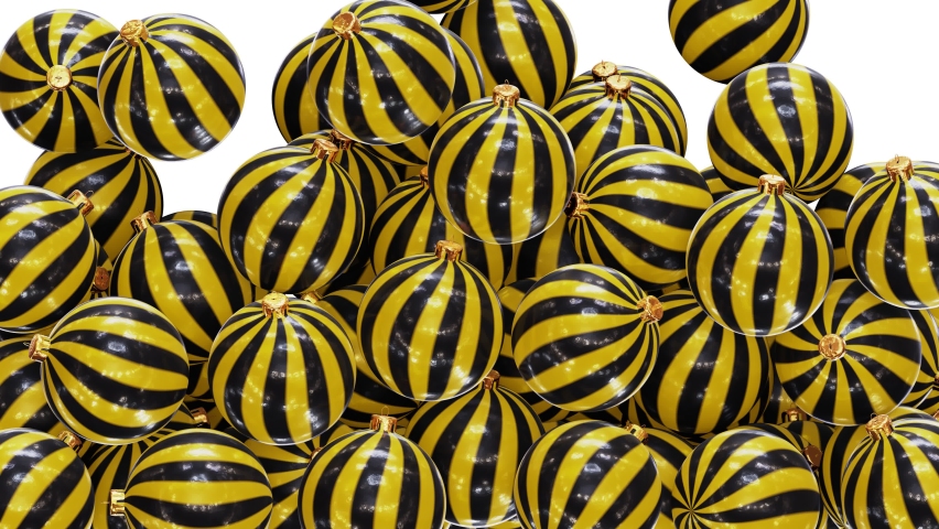 Realistic 3D animation of the black and yellow striped Christmas baubles falling from the top filling up the screen rendered in UHD with alpha matte
