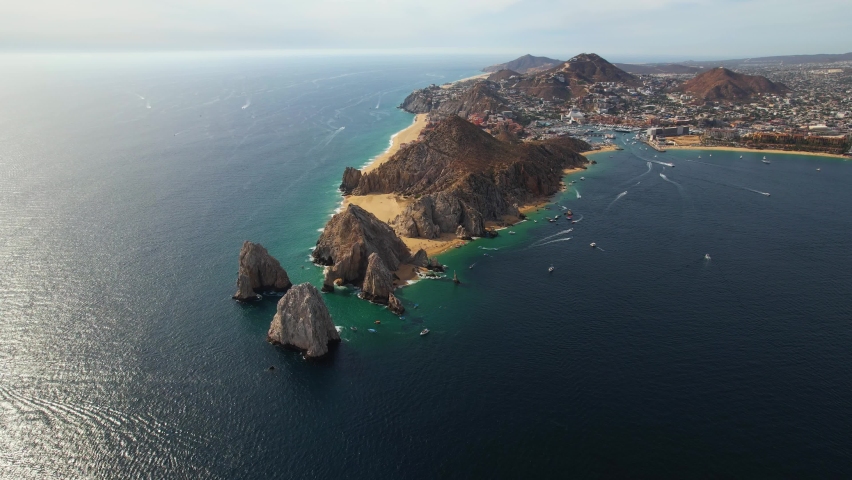 Aerial view towards the rocky cape of Cabo San Lucas, sunny Baja California, Mexico Royalty-Free Stock Footage #1096465043