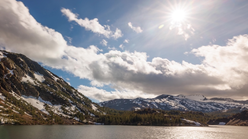 Time Lapse of the clouds moving across the sky above Ellery Lake outside the entrance to Yosemite in the Sierra Nevada Mountains in California