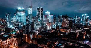 Bright and impressive skyline of a modern architecture and financial buildings in Montreal Canada at Night
