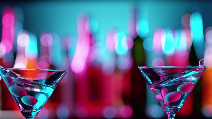 Super Slow Motion of Martini Cocktails Hitting Together in a Bar, Cheers Concept. Filmed on High Speed Cinema Camera Royalty-Free Stock Footage #1096505937