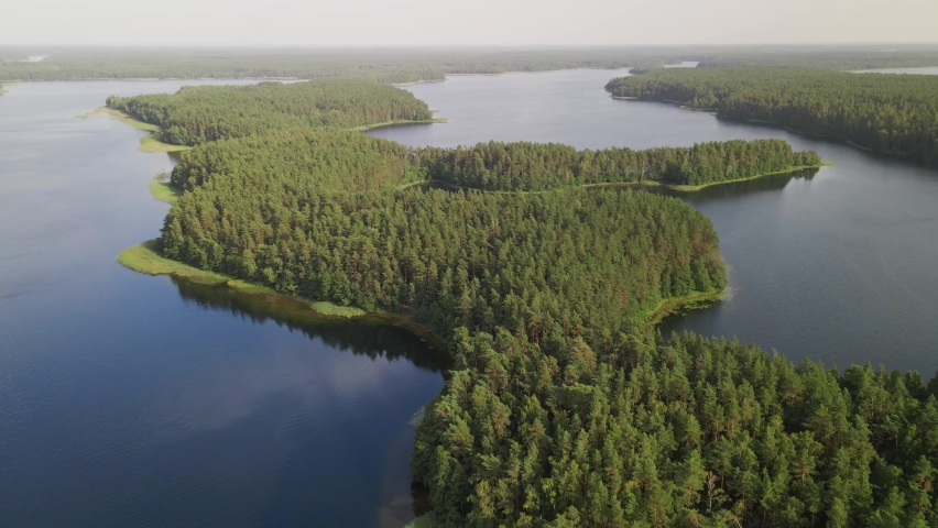 Aerial view of remote forest area and lakes in Labanoras Regional Park, Lithuania Royalty-Free Stock Footage #1096511289