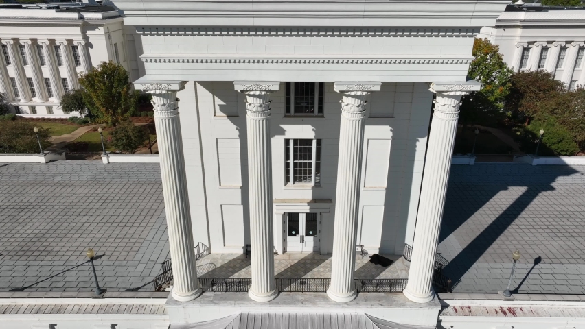 Alabama state capitol and government buildings. State Supreme Court in Montgomery Alabama. Rising aerial.