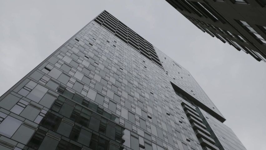 Looking Up On The Contemporary Facade Of A High-Rise Building In Montreal, Quebec Canada. Low Angle