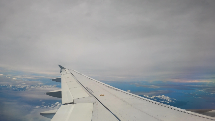 Passenger's View Of An Airfoil. Wing Of An Airplane In Flight To Queenstown, New Zealand. POV Royalty-Free Stock Footage #1096545317