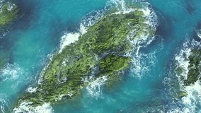 4k video  aerial view of the Andaman Sea, hitting the rocks. Spectacular views of amazing beaches, turquoise waters.