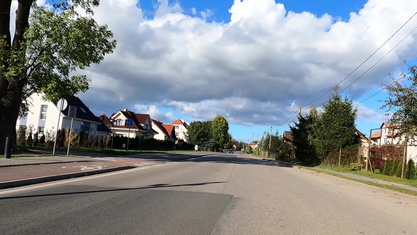 Beautiful nature of Poland autumn. The car is driving on the road Poland.