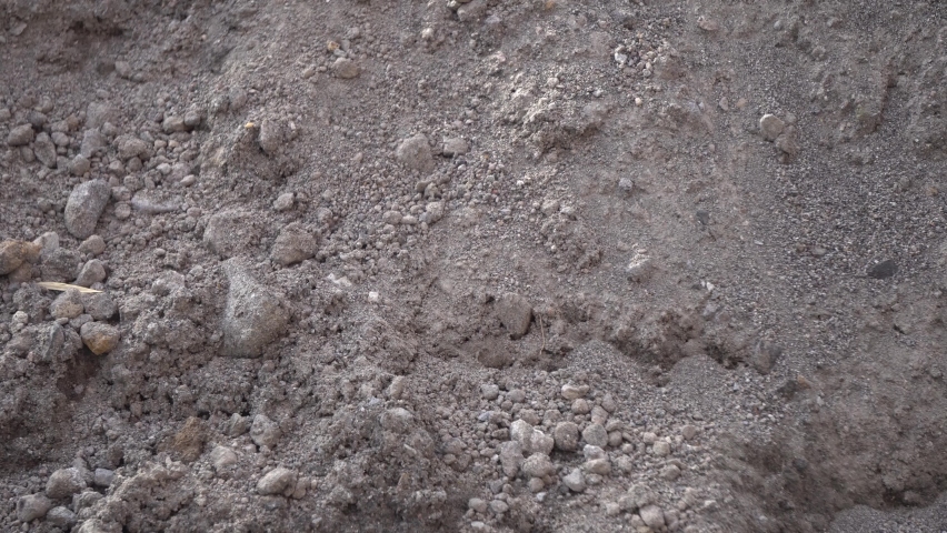 Temanggung, Indonesia - September 2022 : close up of sandstone in gray color, perfect for video background, documentation, education, ect.