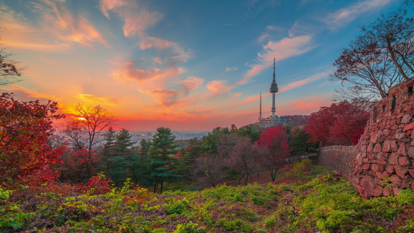 (Time lapse 4k)autumn at sunset with Seoul, namsan mountain popular tourist destinations in Seoul,South Korea Royalty-Free Stock Footage #1096557263