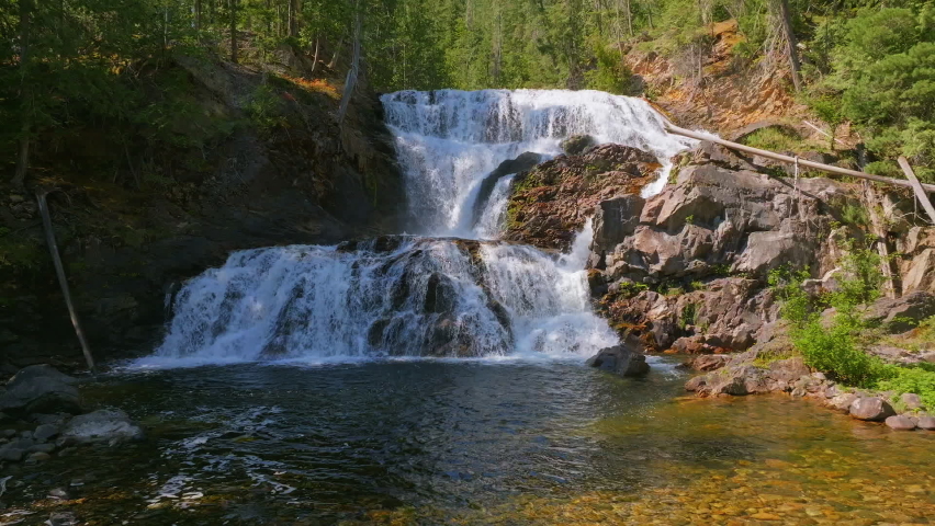 A beautiful view of the Albas Falls in the wild nature in Canada