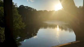 A beautiful golden sunset from an old bridge. - Powered by Shutterstock - Get 15% off with code: PIKWIZARD15