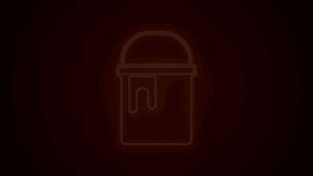 Glowing neon line Paint bucket icon isolated on black background. 4K Video motion graphic animation.