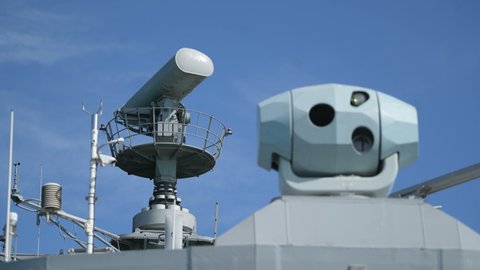 Стоковое видео: Image of a military radar air surveillance on navy ship tower.