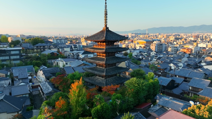 Kyoto aerial view with Yasaka pagoda at sunrise, Japanese cultural centre, Kyoto, in the morning, flying around famous shrine of Yasaka pagoda. High quality 4k footage Royalty-Free Stock Footage #1096586417
