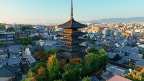 Kyoto aerial view with Yasaka pagoda at sunrise, Japanese cultural centre, Kyoto, in the morning, flying around famous shrine of Yasaka pagoda. High quality 4k footage