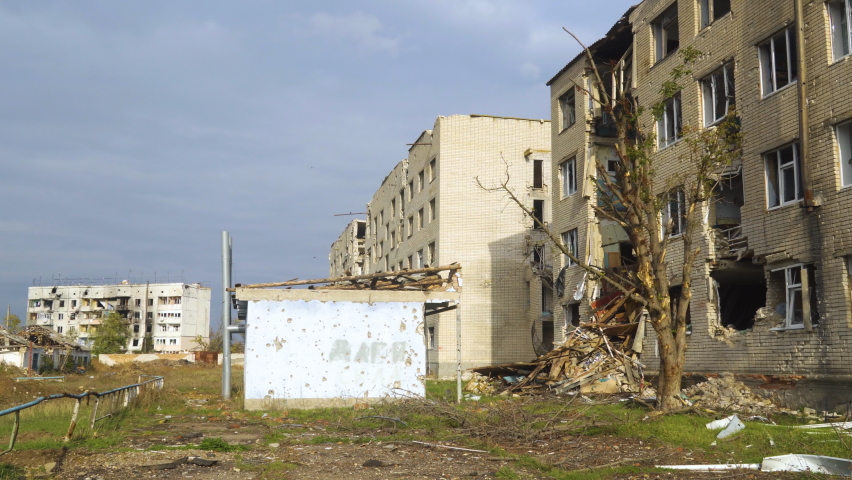 War in Ukraine. Russian invasion of Ukraine. Destruction of infrastructure. Terror of the civilian population. Residential building destroyed by shelling. Panorama. The camera moves from left to right