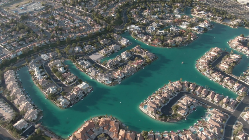 High aerial of West Sahara Las Vegas private neighborhood with lakefront homes