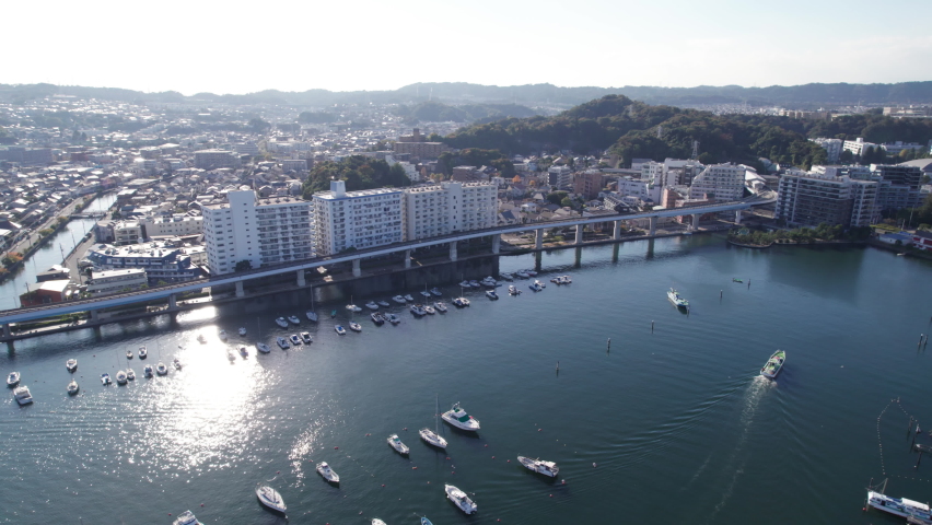 Sun shines on the Hiragata bay in the Kanazawahakkei area of Yokoahama, Many boats can be seen in the bay