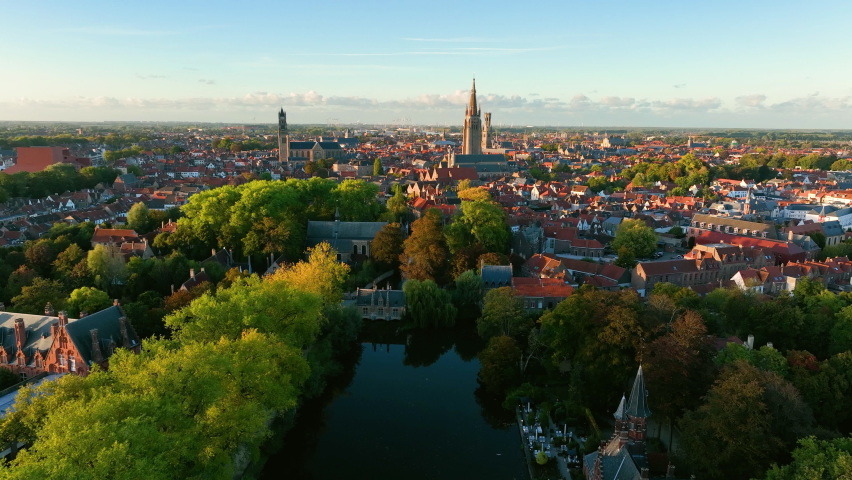 Aerial of Belfry of Bruges is a medieval bell tower in the centre of Bruges Belgium. 4k Royalty-Free Stock Footage #1096625405