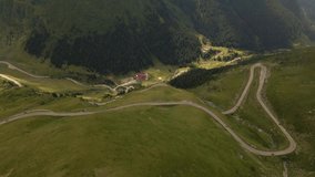 Drone video of the famous Transfagarasan Road, in Romania. Footage was taken from a drone with camera tilted horizontally for a panoramic shot of the curvy road.
